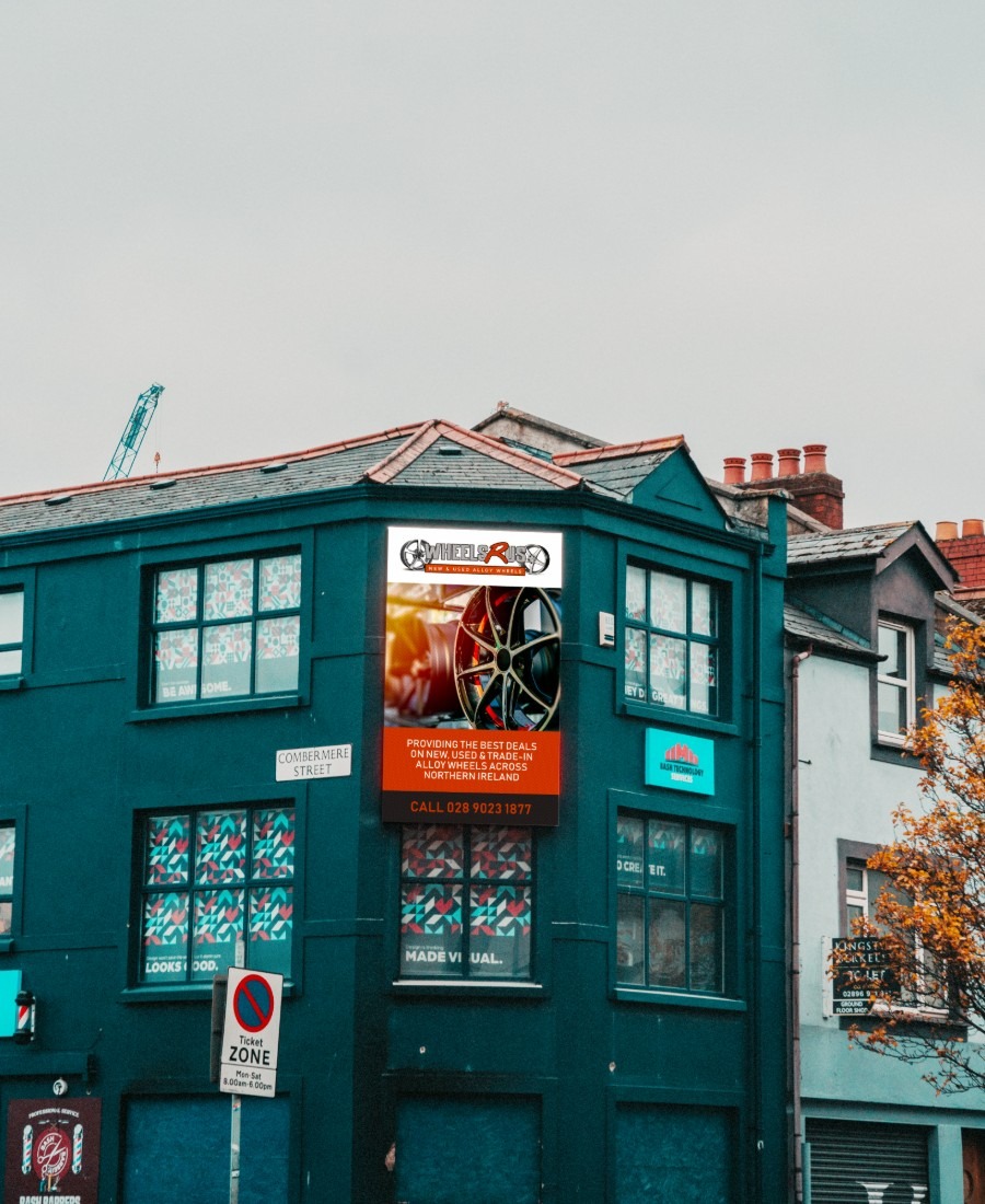 Wheels R Us ad on donegall road screen